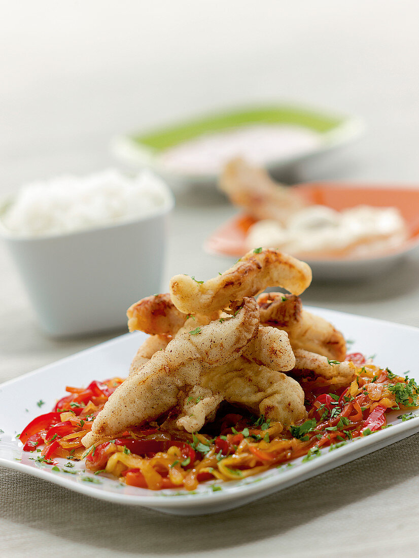 Peking Pork chops- breaded, deep-fried pork Chops on sweet and sour vegetables