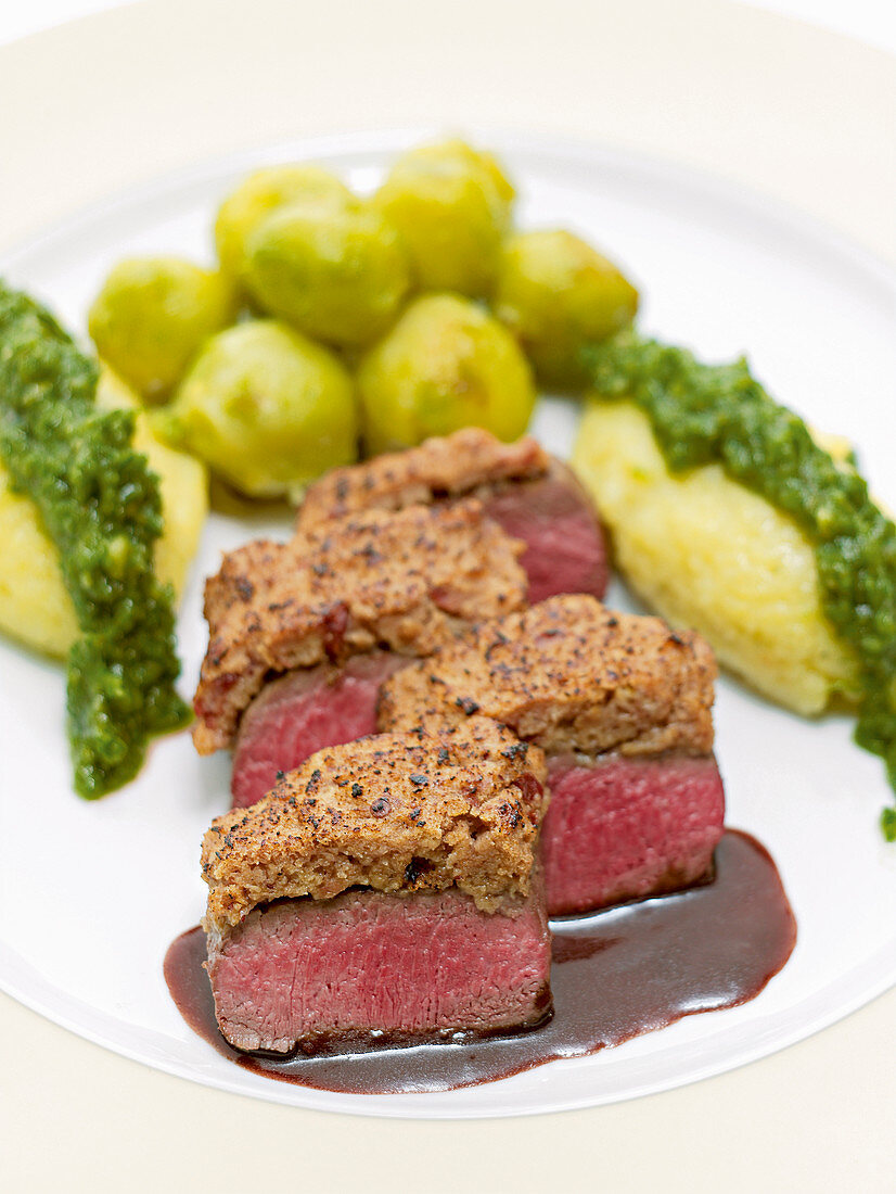 Venison Tenderloin with walnut polenta and Brussels sprouts