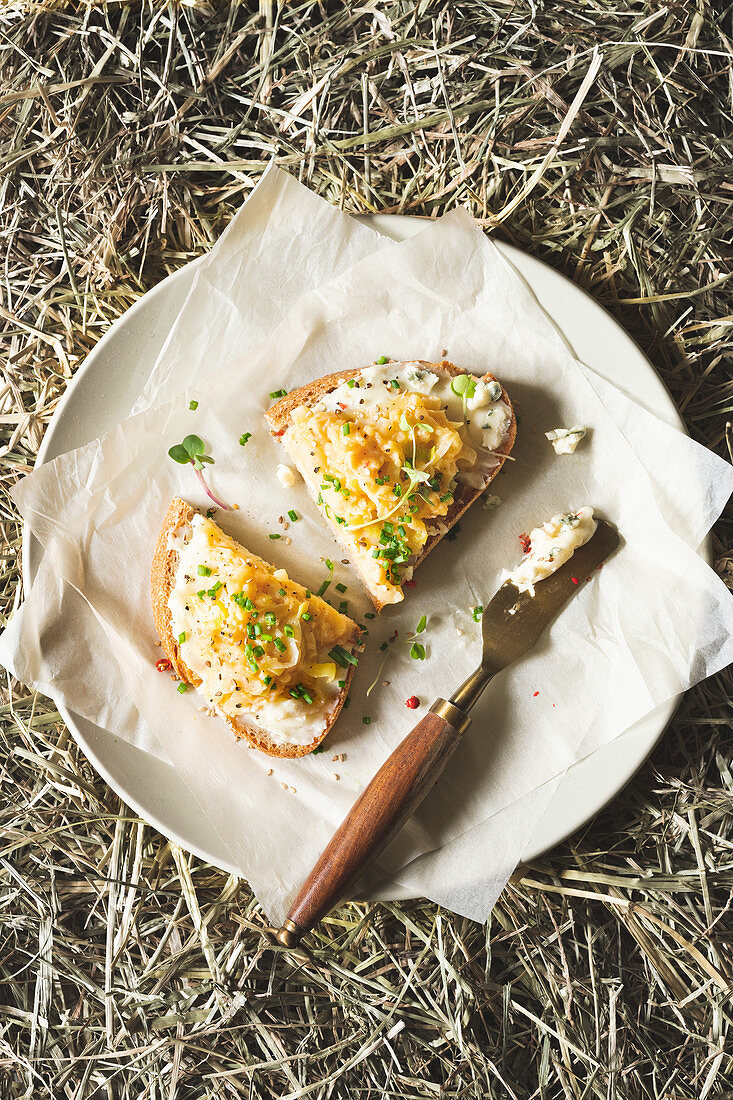 Blue cheese and scrambled eggs on toasted bread