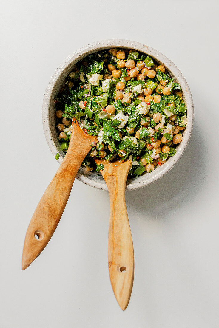 Green chickpea salad with fresh herbs and feta