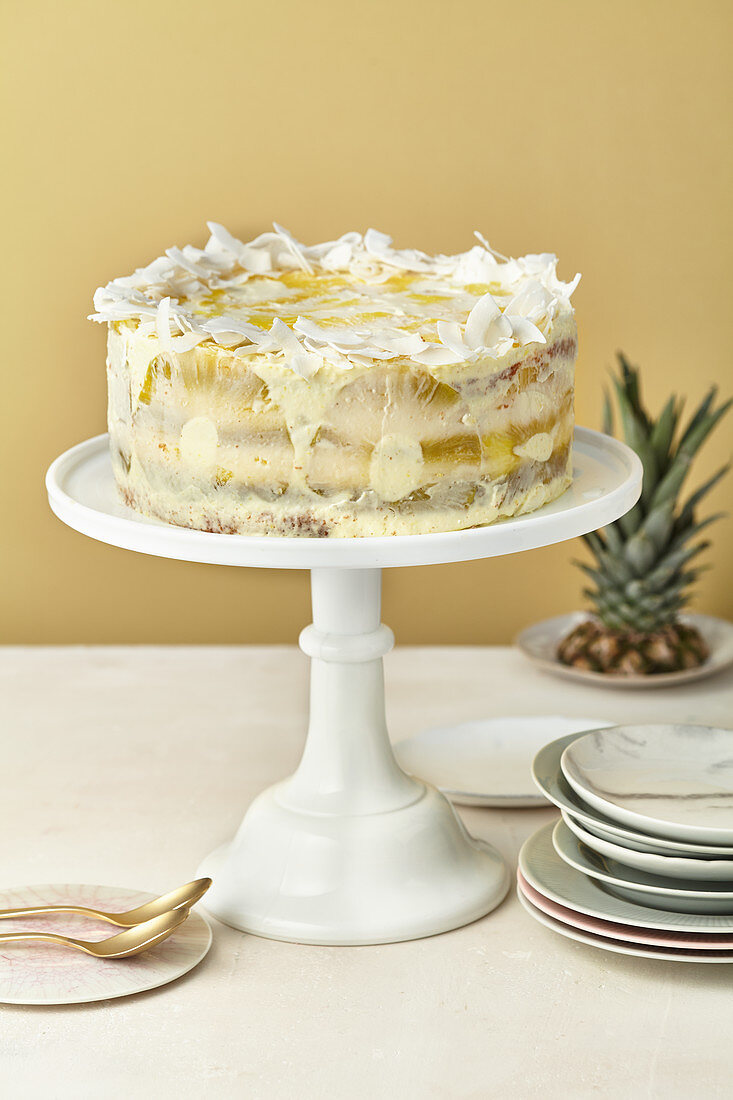 Half-naked pina colada cake with pineapple and coconut