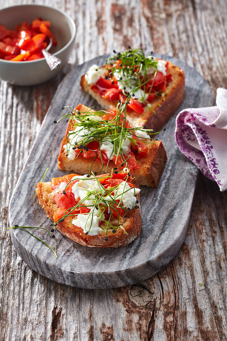 Crusty country bread with peppers and burrata