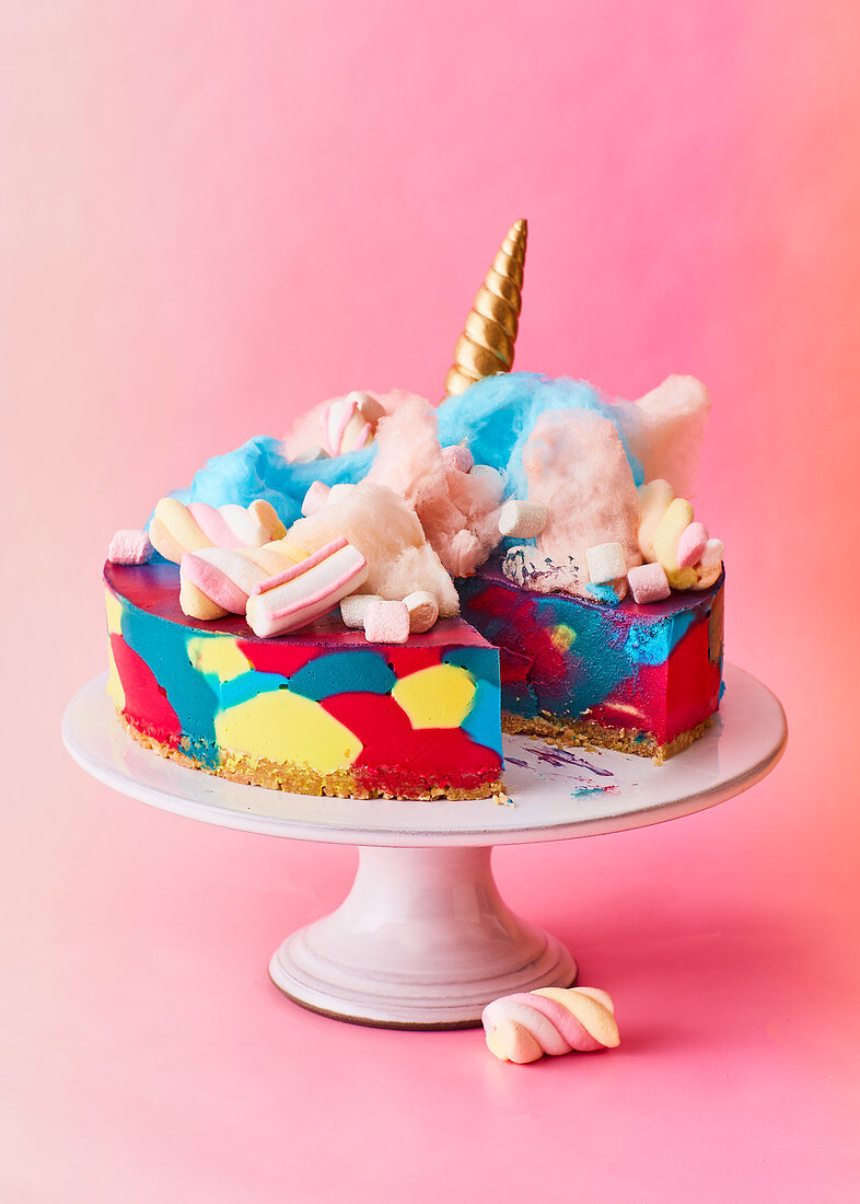 Colorful unicorn cheesecake cake