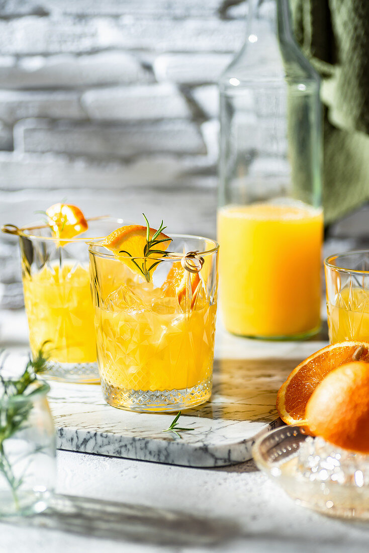 Orange juice and rosemary drink