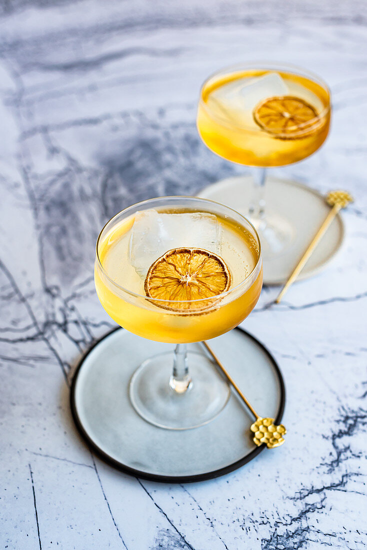 Hazelnut cocktail with dried lemon slices