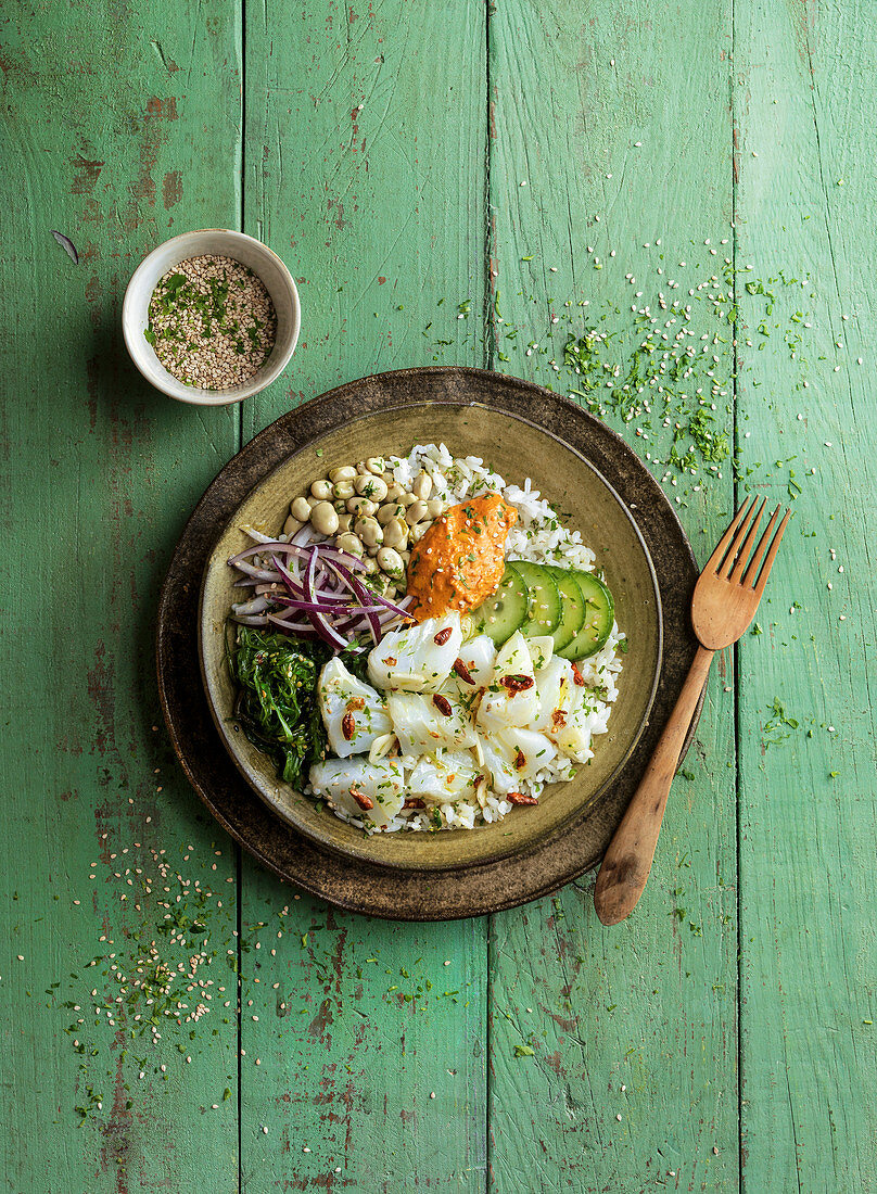 Healthy bowl with cod and vegetables