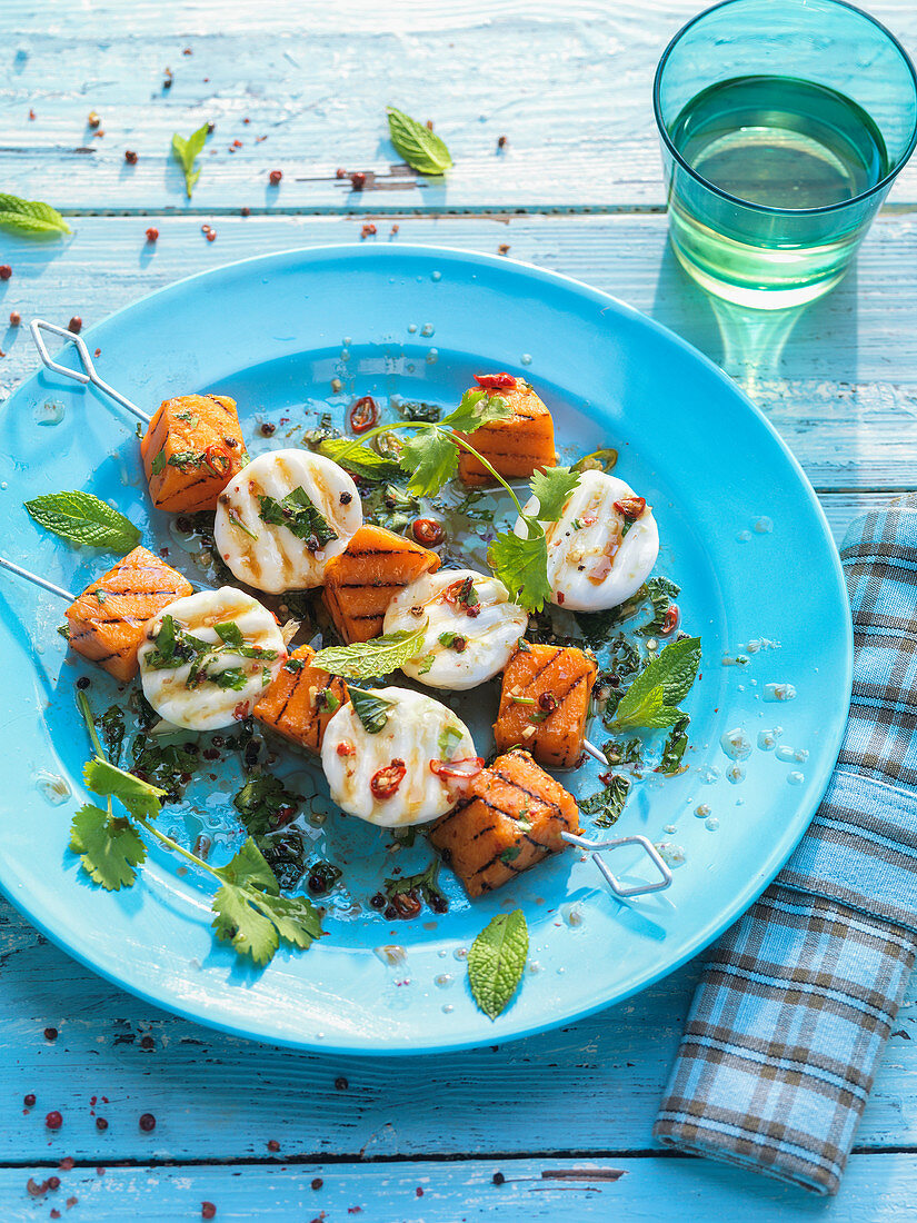 Grilled pumpkin and goat’s cheese skewers with chilli and coriander