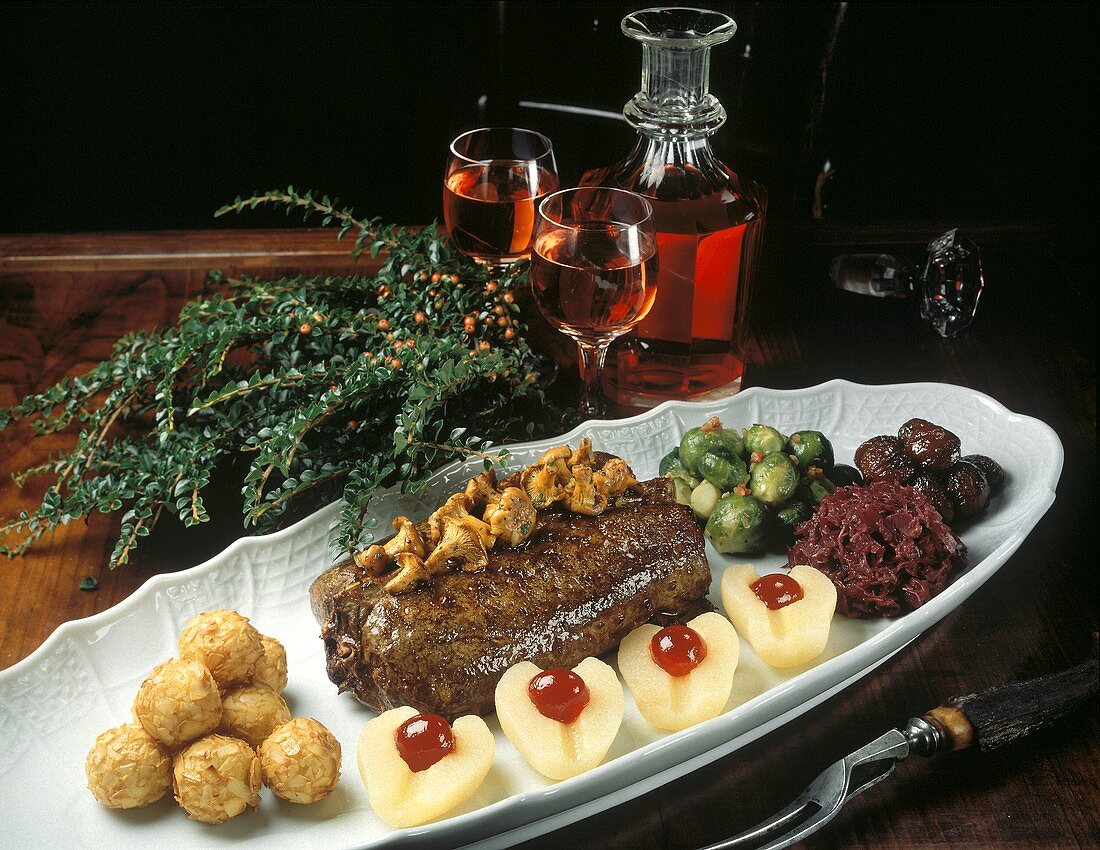 Venison with mushrooms, almond croquettes, pears &vegetables