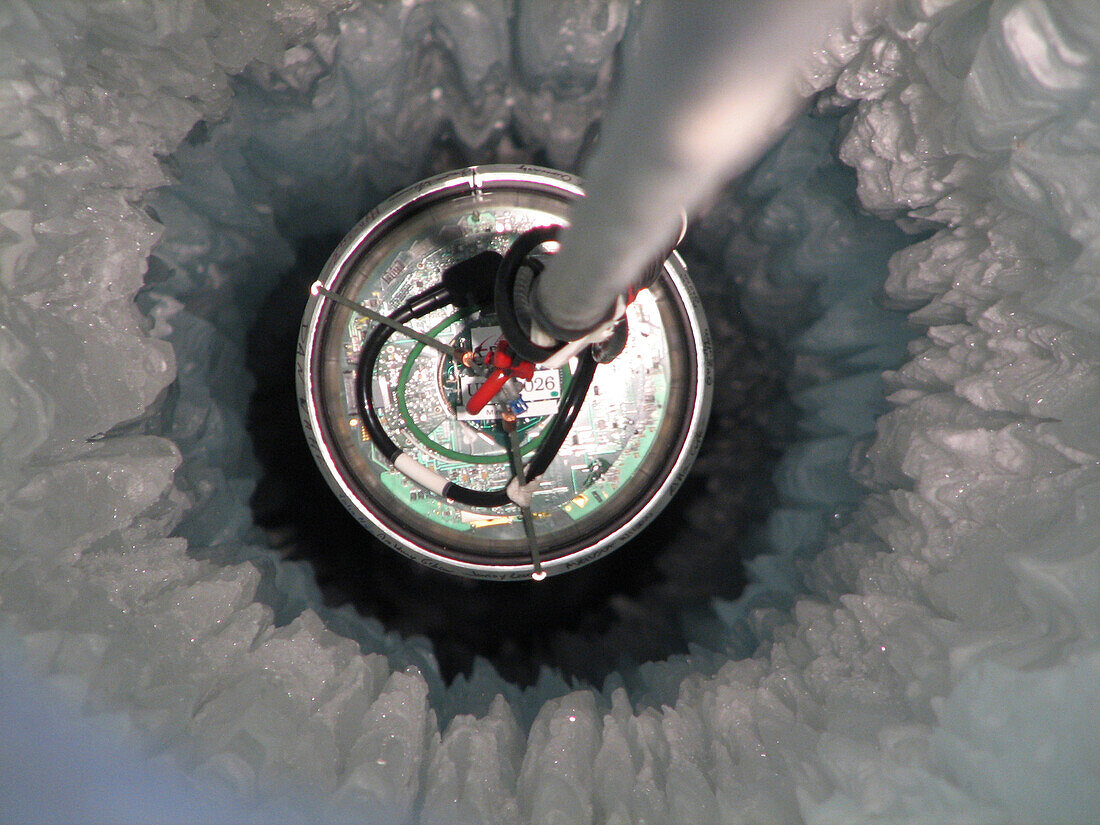 Digital optical module being lowered, South Pole