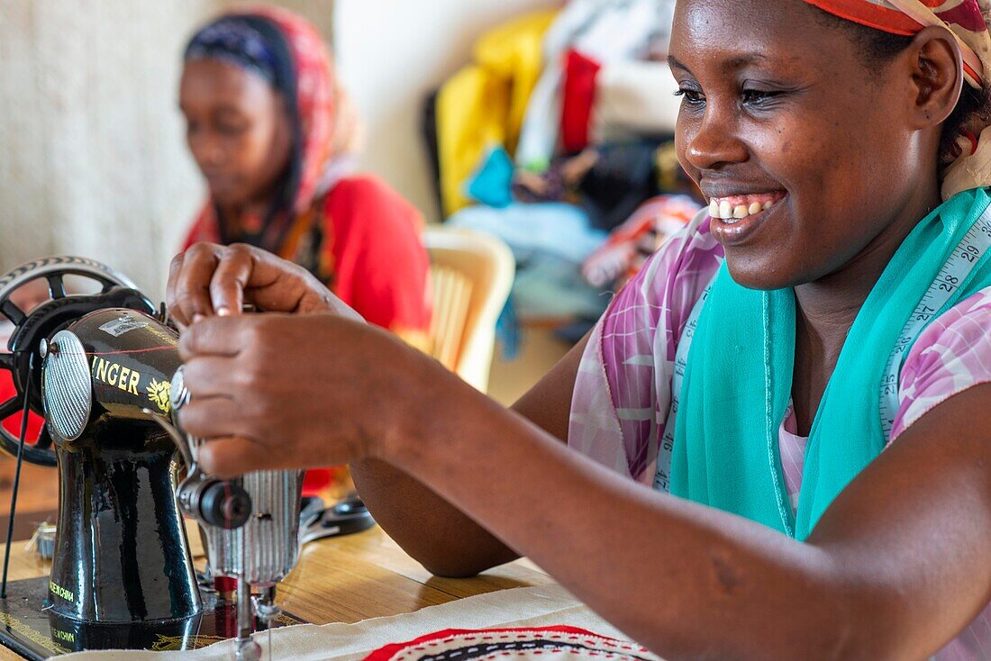Women sewing cloths, Lamu, Kenya