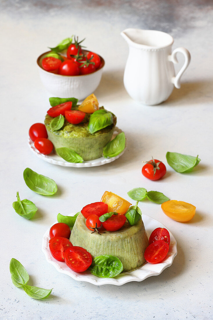 Sheep ricotta flans with basil and tomatoes