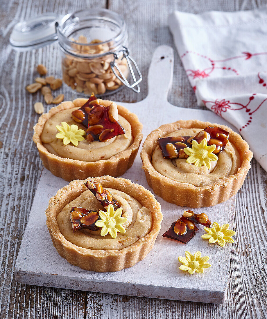 Peanut tartlets with beer caramel