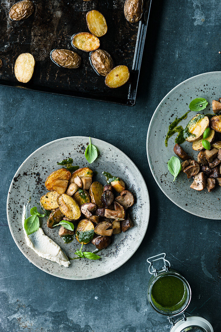 Fried porccini mushrooms with baked potatoes and Parmesan cream