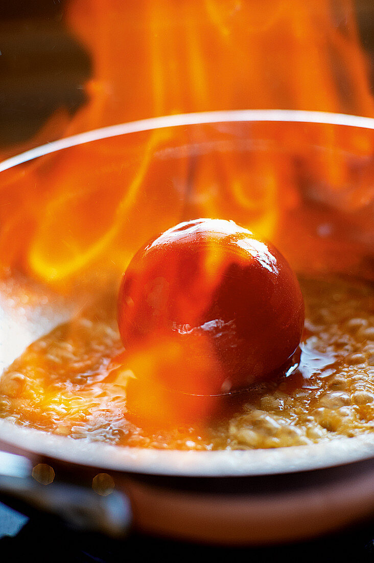 Flambéed, jellied tomato