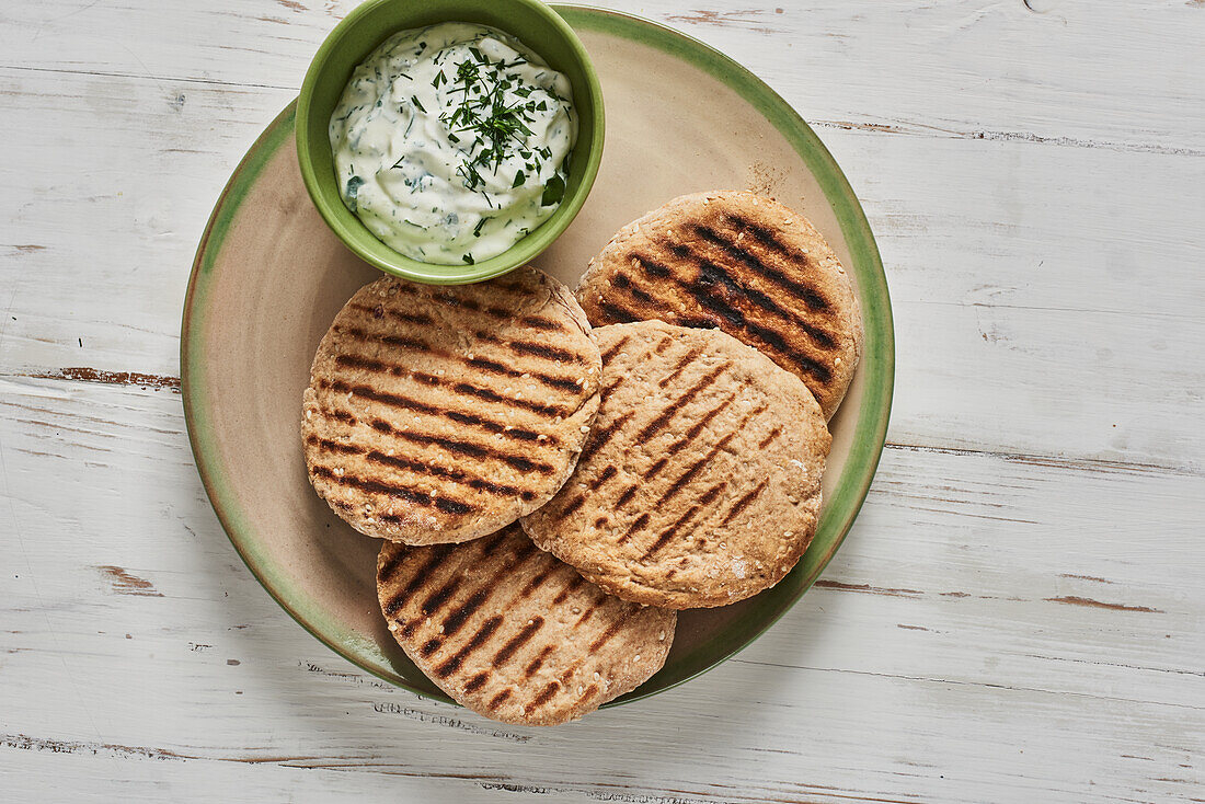 Grilled sesame pancakes with herb curd cheese