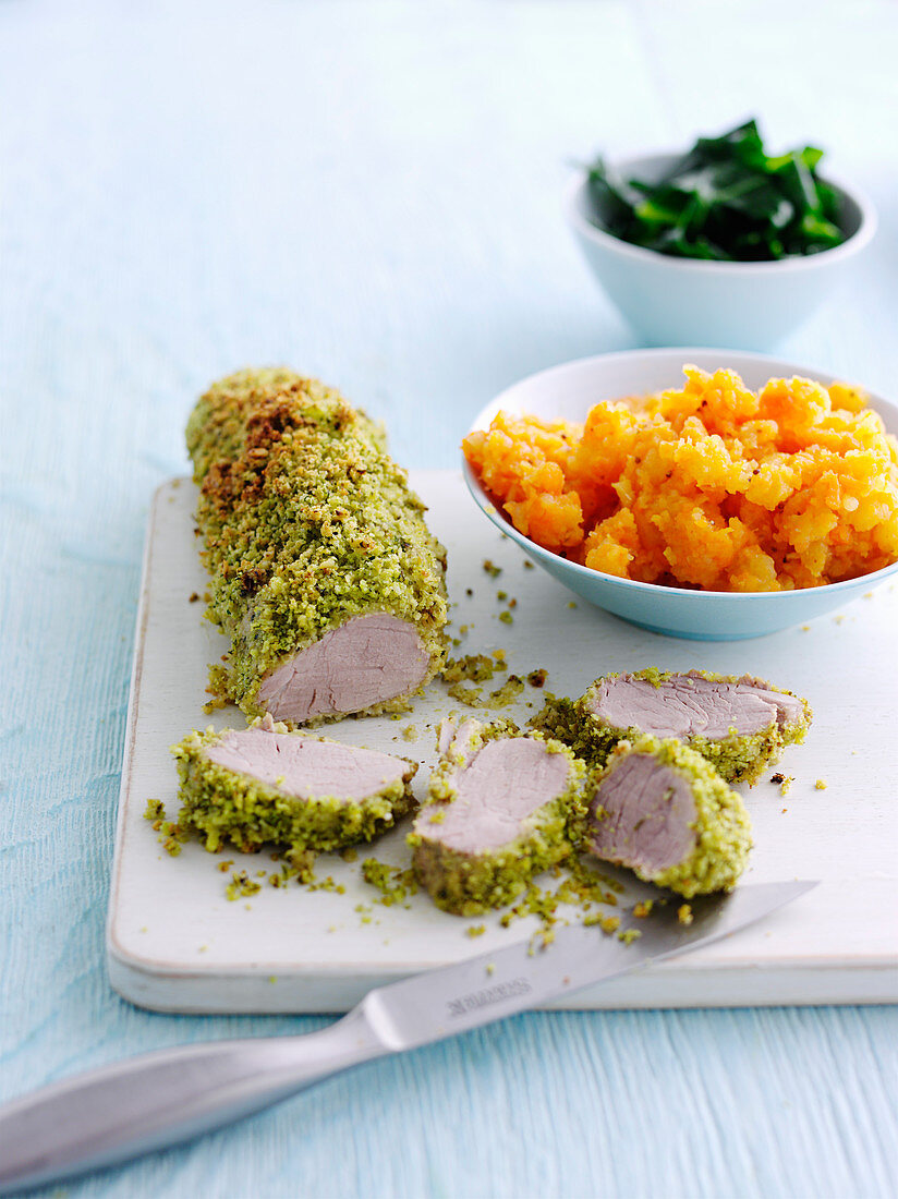 Mustard-crusted pork with carrot and swede mash