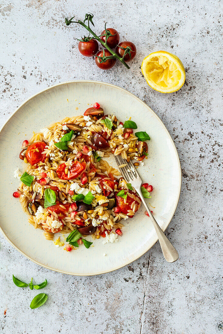 Rice noodle salad with tomato and feta