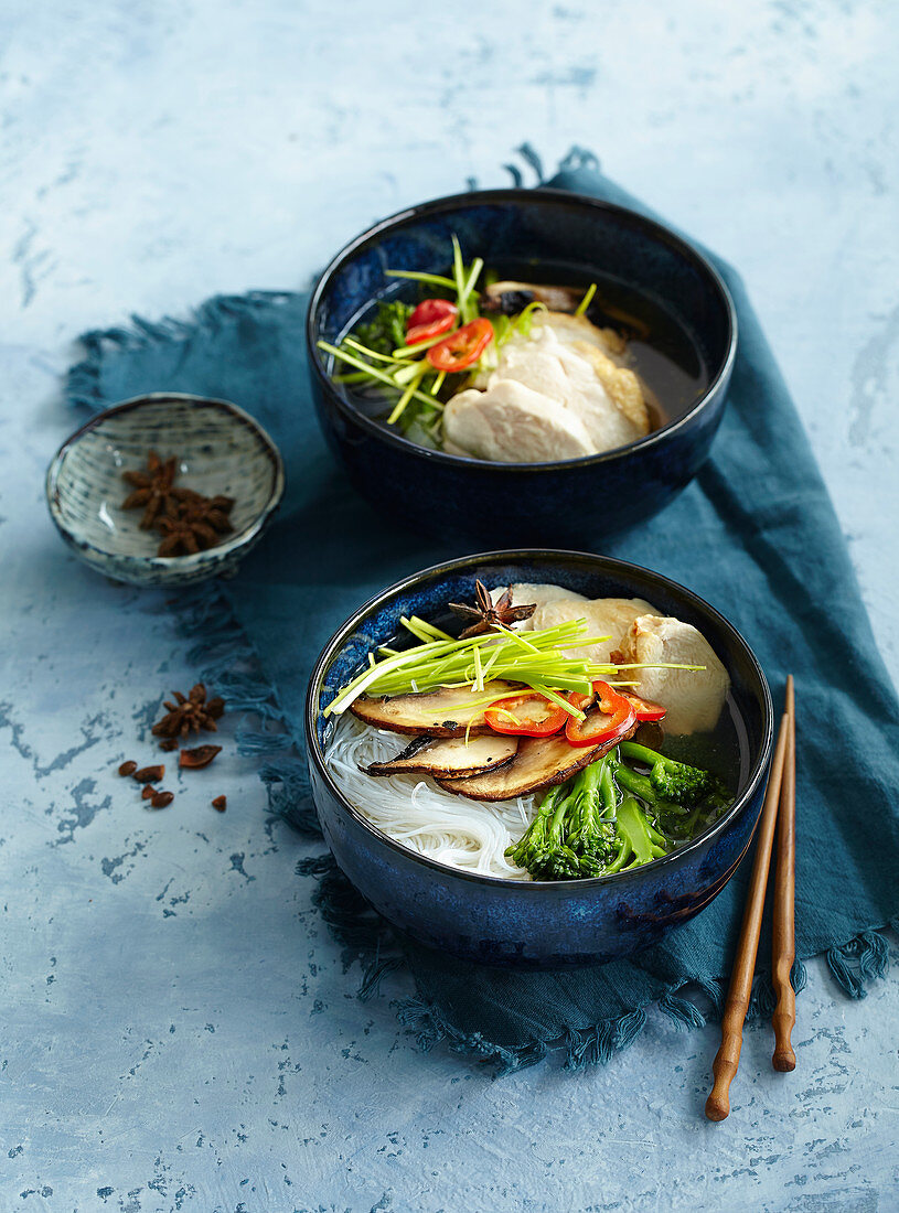 Asia chicken soup with noodles and broccoli