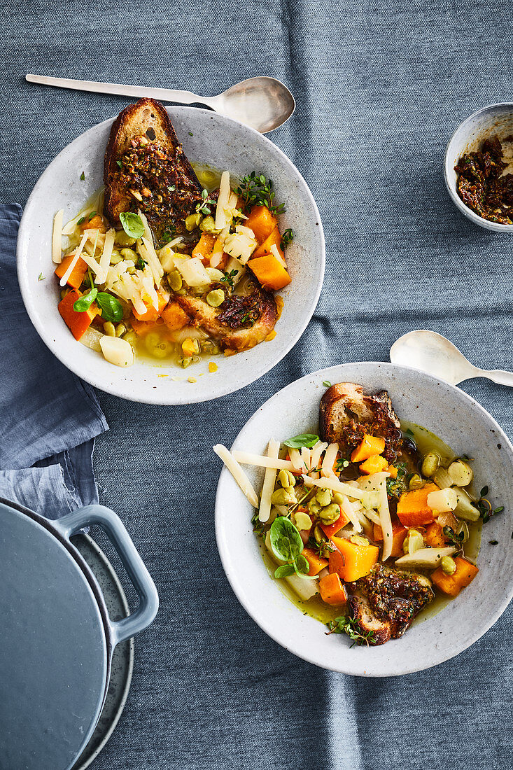 Black salsify and bean stew with toasted bread and tomato pesto