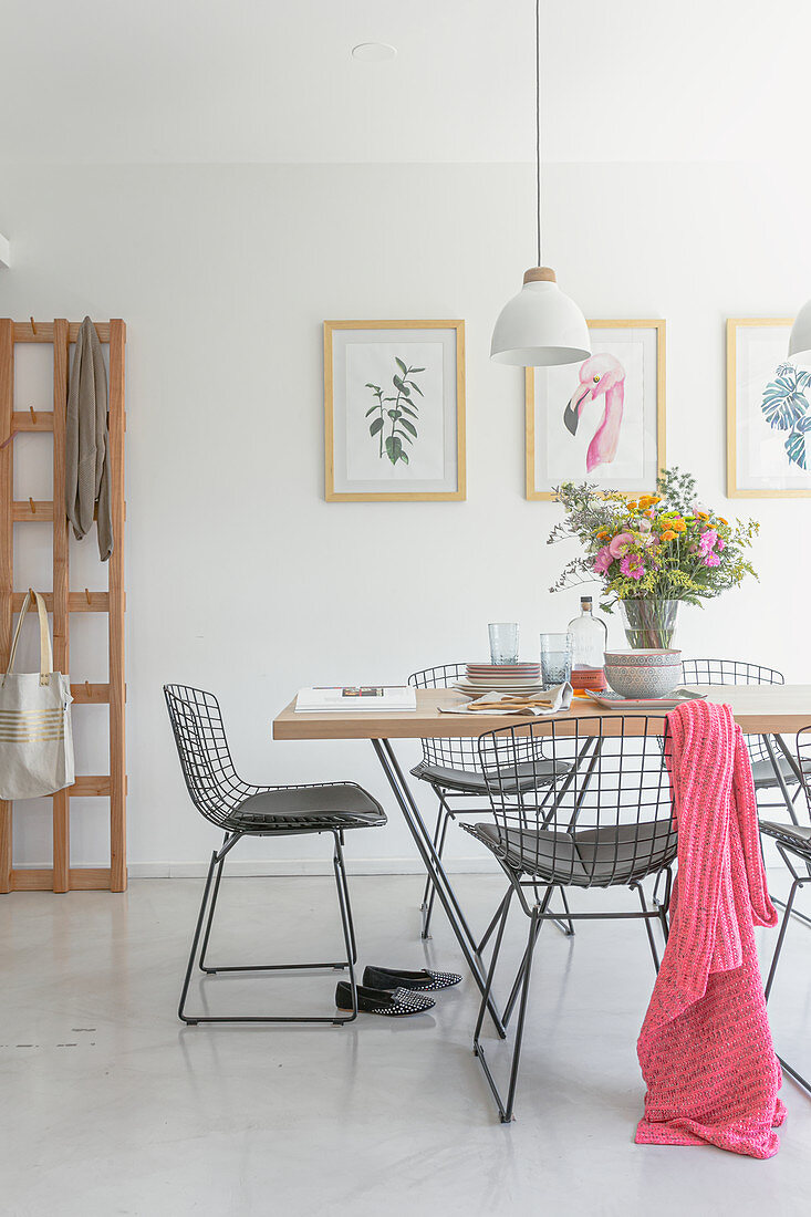 Dining table and classic chairs in a bright room