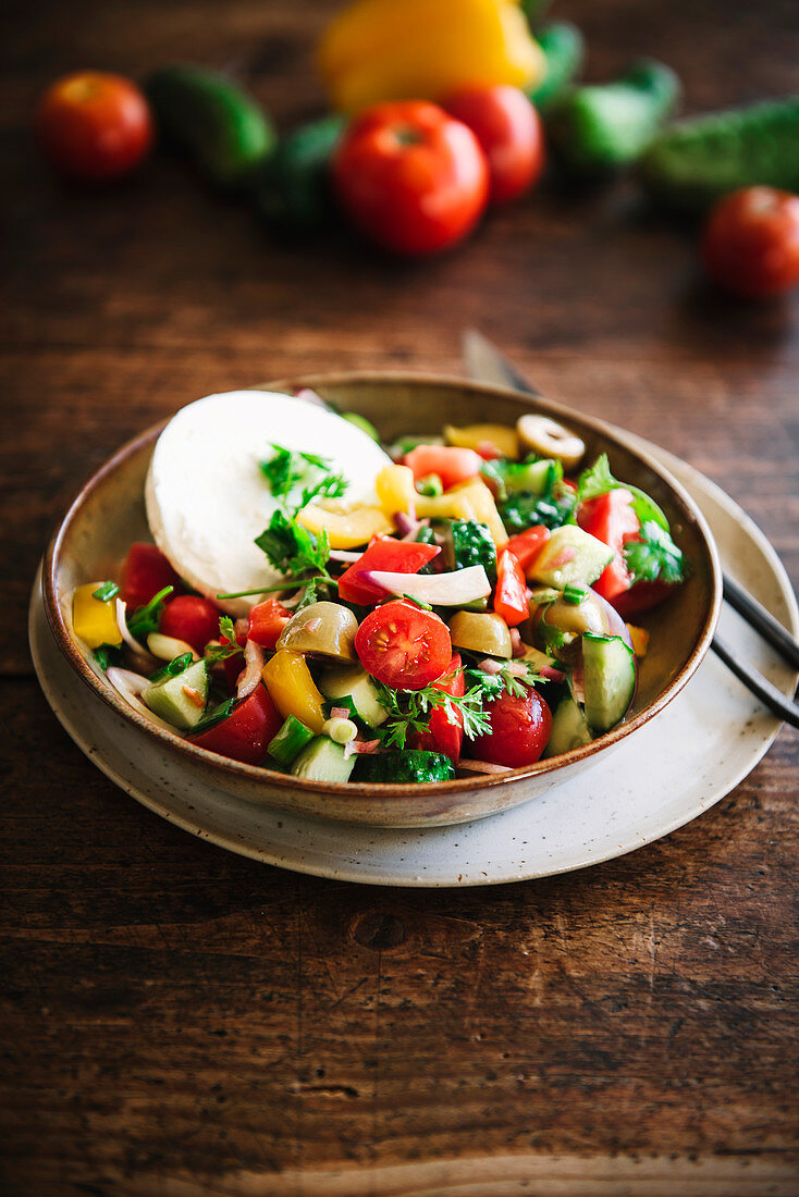 Bulgarian vegetable salad with goat's cheese