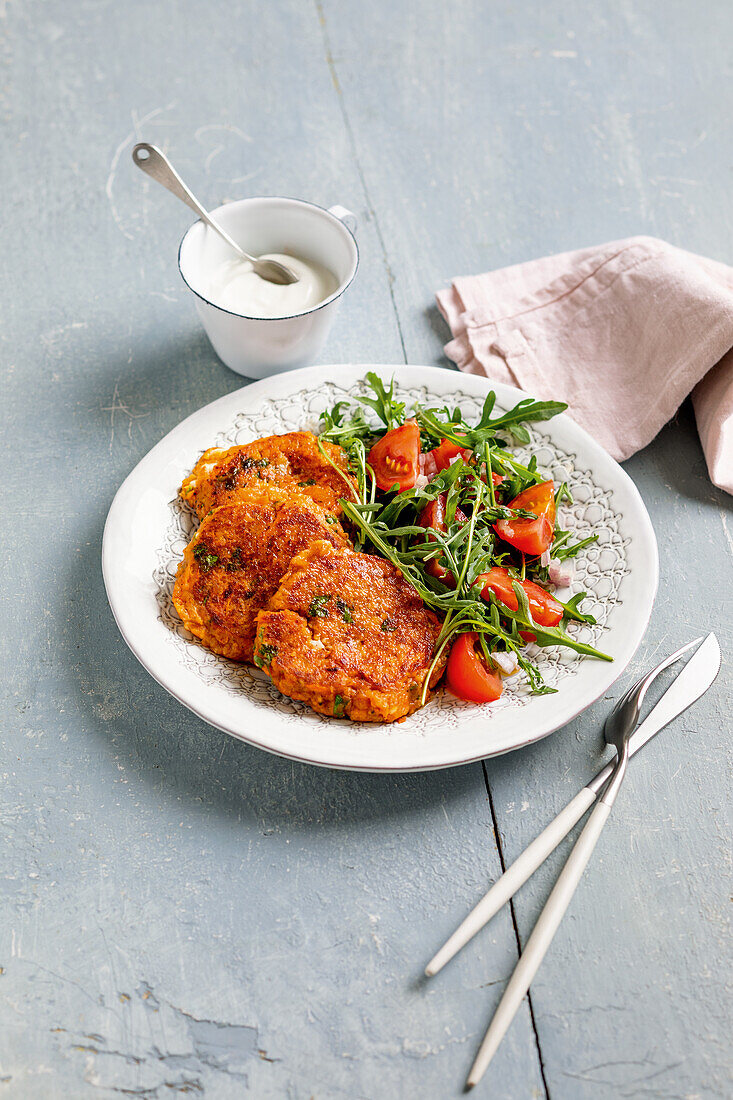 Vegetarian lentil meatballs with tomato-rocket salad