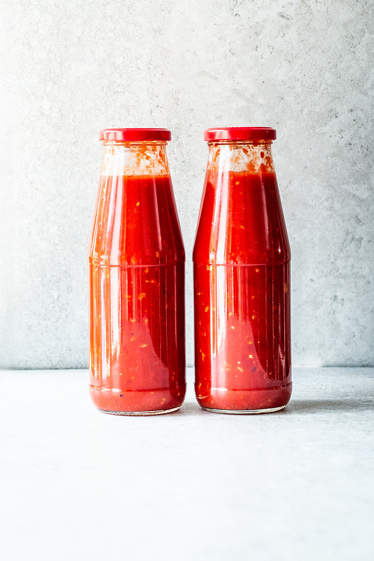 Tomato sauce in glass bottles