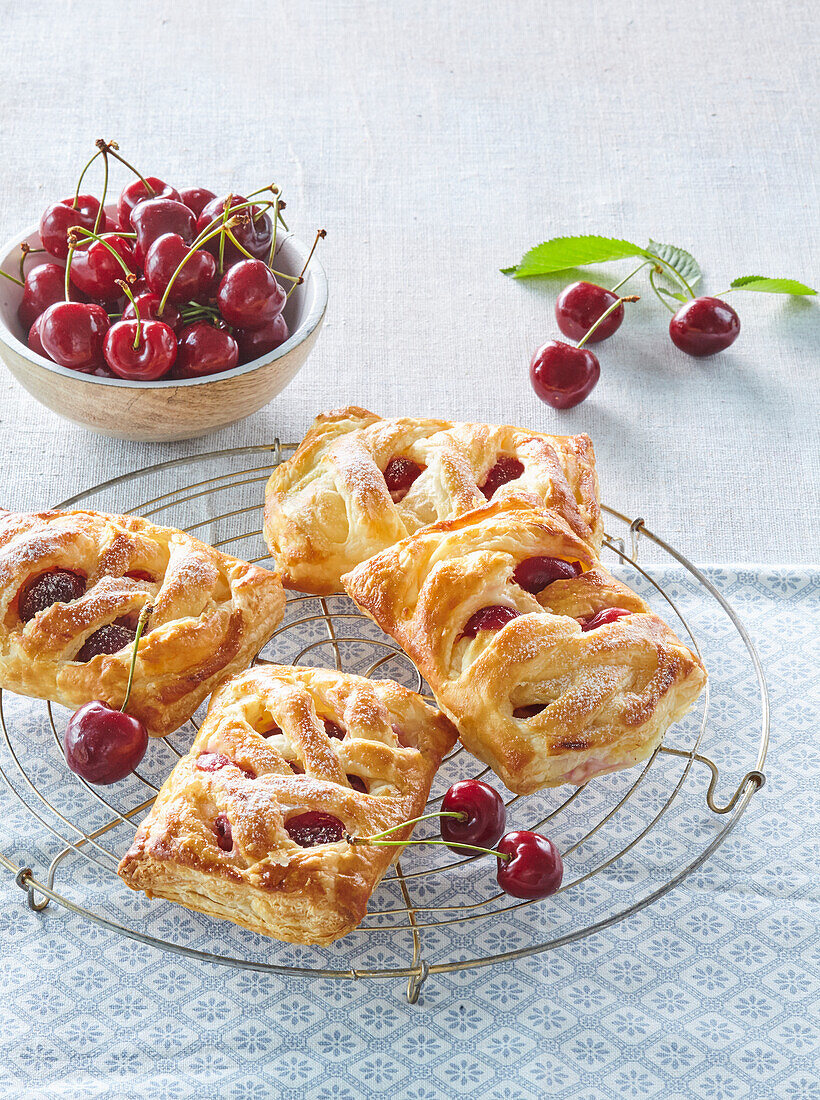Cherry pastries on cooling rack