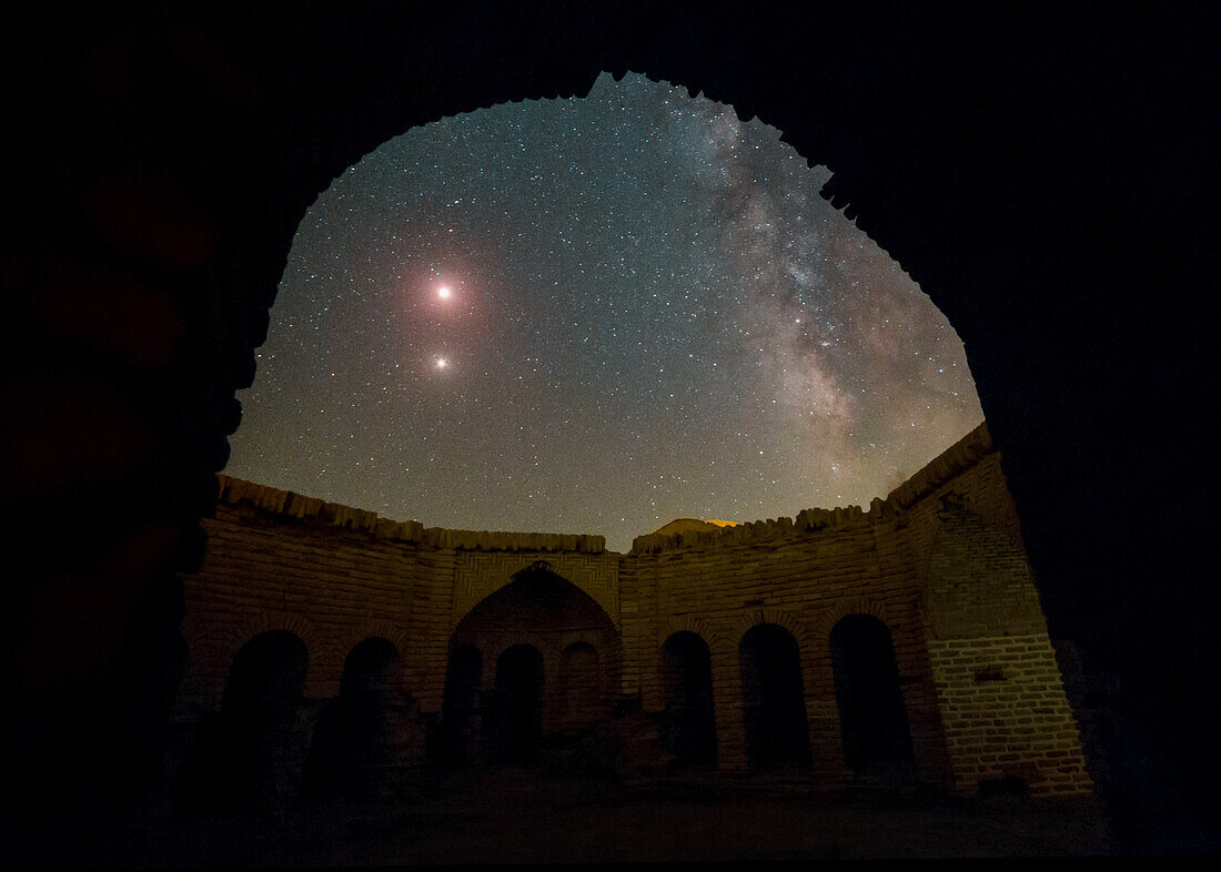 Lunar eclipse, Milky Way and Mars over a caravanserai, Iran
