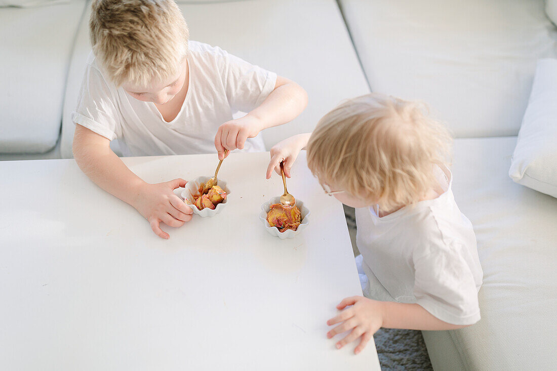 Brothers having snack