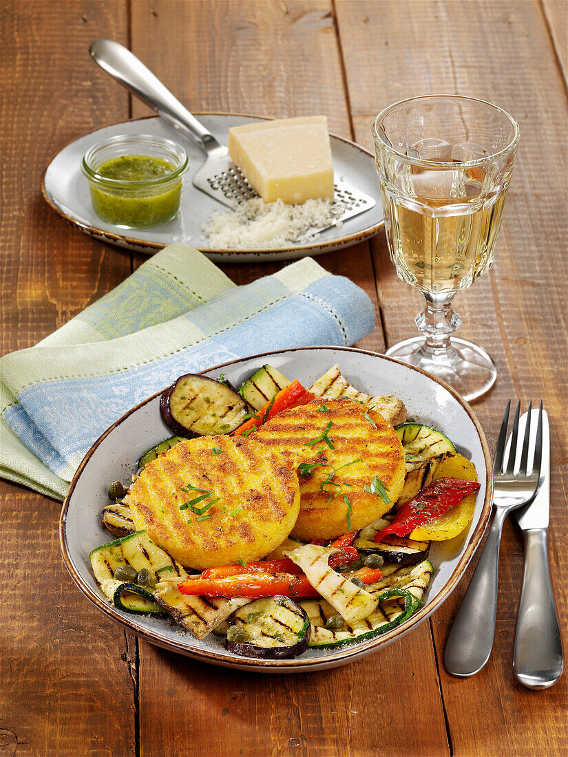 Corn semolina patties with grilled antipasti vegetables