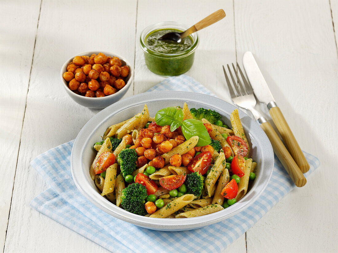 Grape seed pasta with chickpeas, broccoli and tomatoes