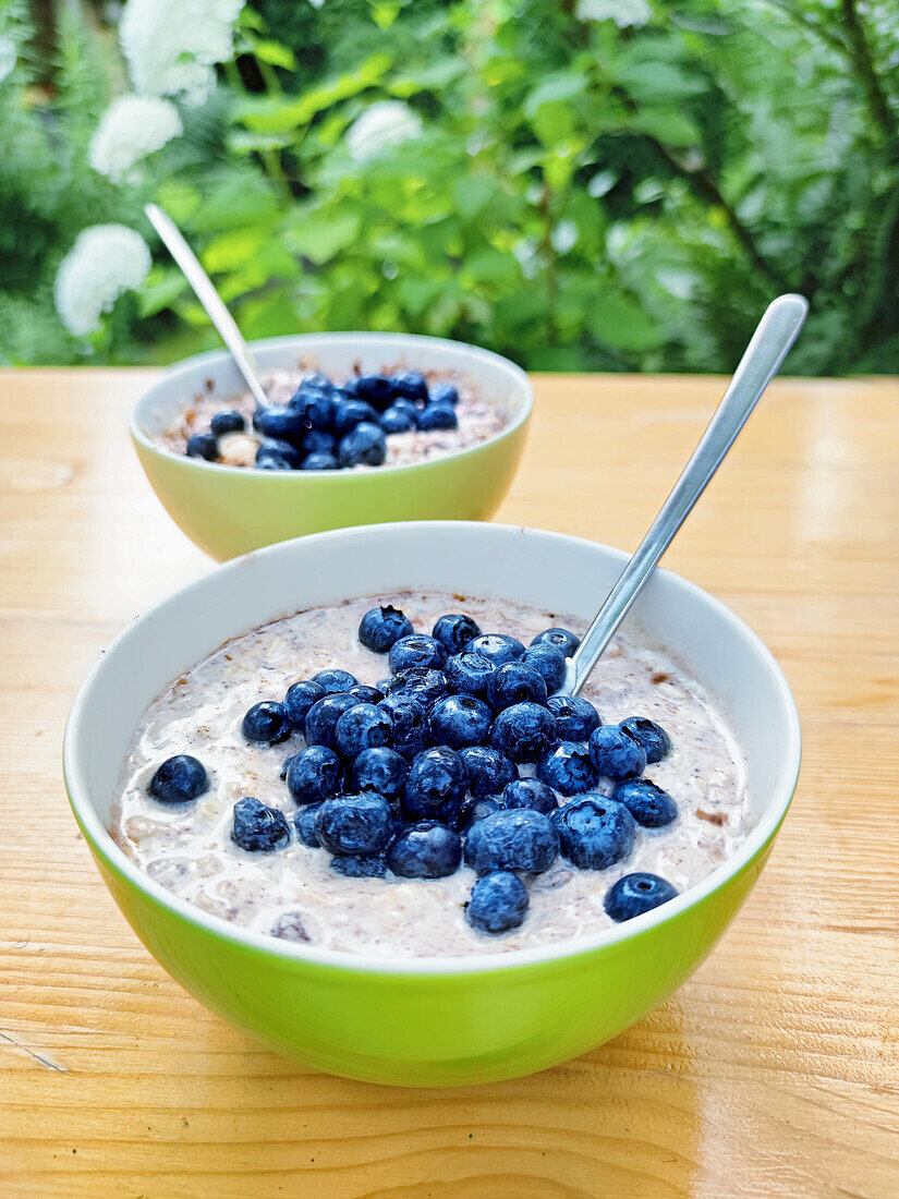 Muesli with blueberries on an outdoor table