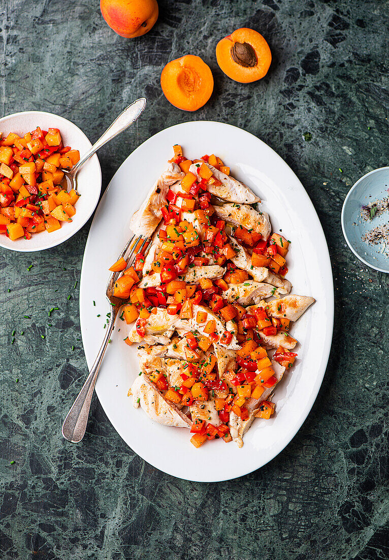 Grilled and sliced Chicken breast with apricot salsa