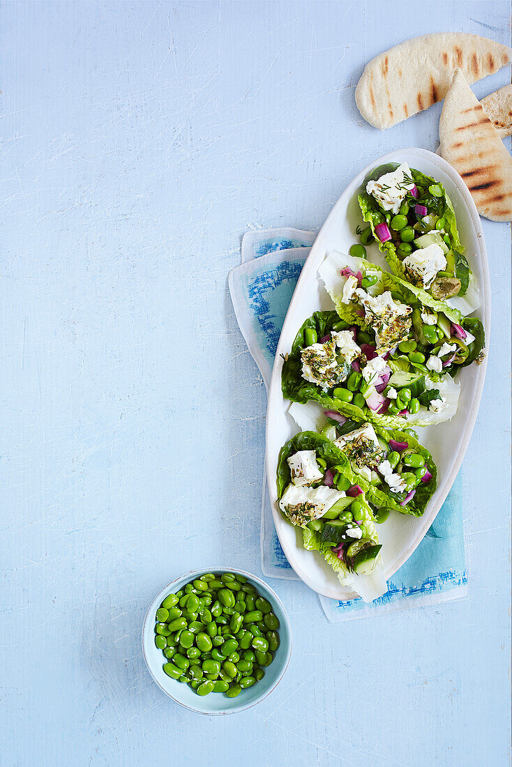 Green Greek salad with marinated feta