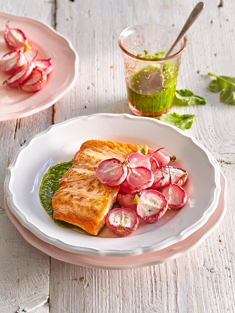 Salmon with baked radishes and radish leaf pesto
