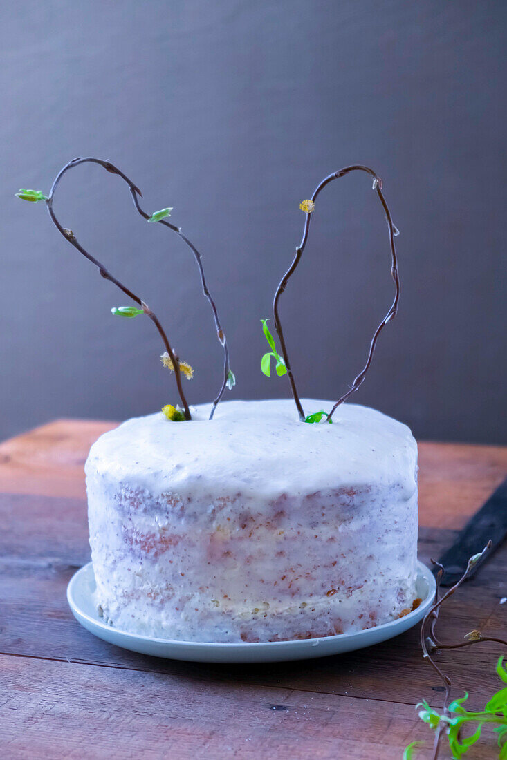 Easter cake with bunny ears made from willow branches