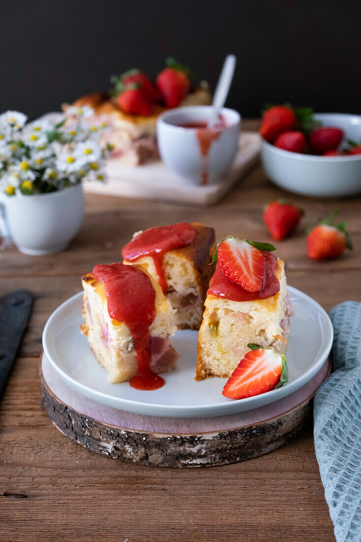 Rhubarb cake with strawberry sauce