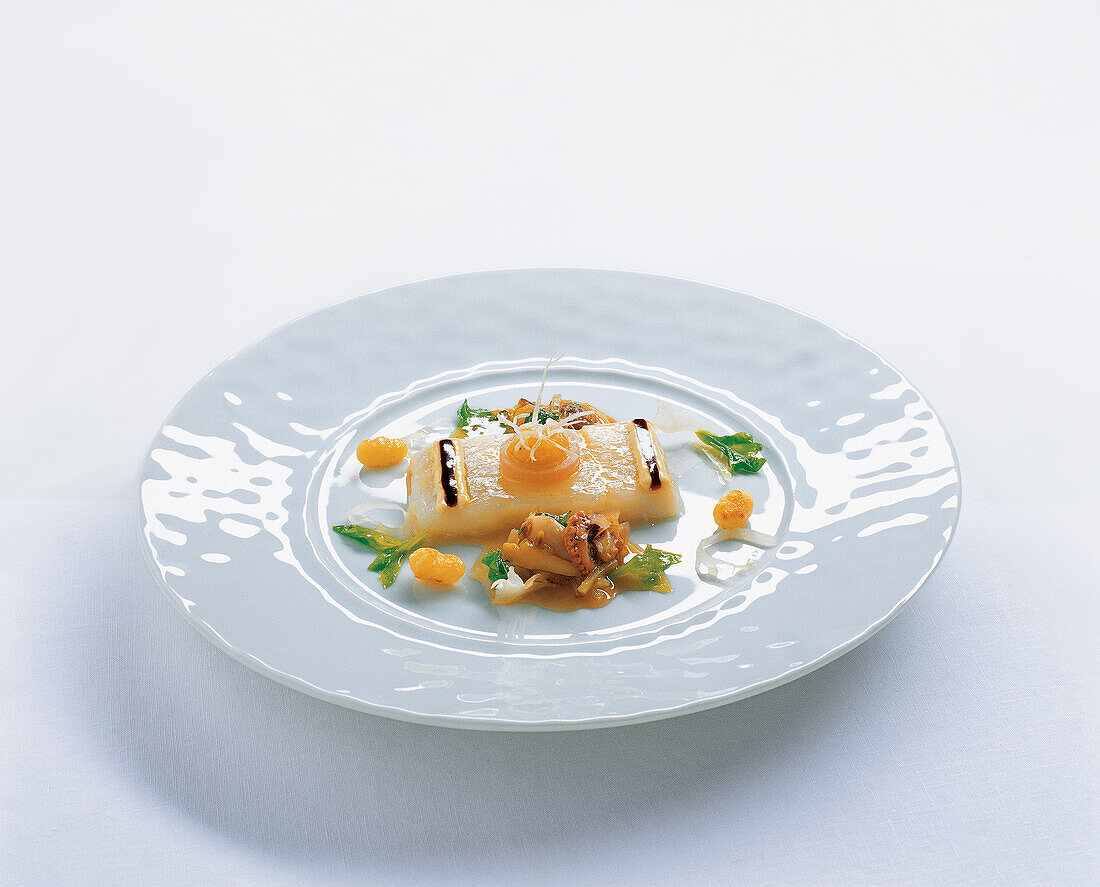 White halibut with lemon confit, seafood, muscovado vinegar and onion gnocchi
