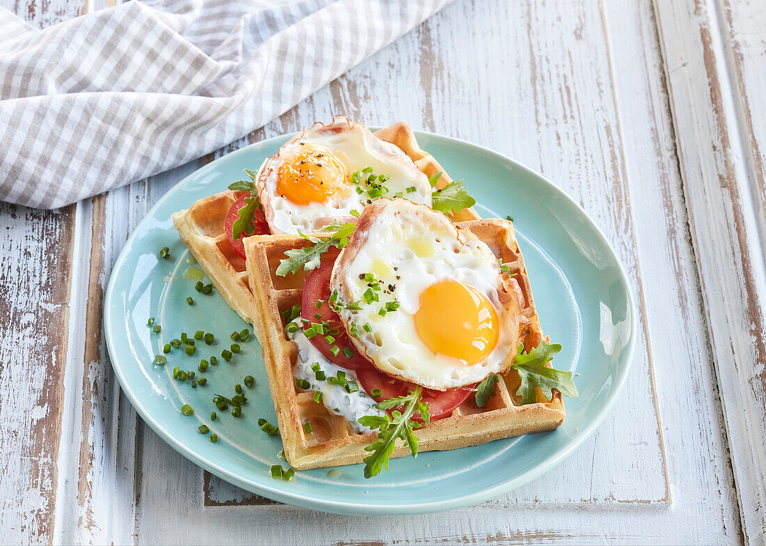 Cheese waffles with ham and fried egg