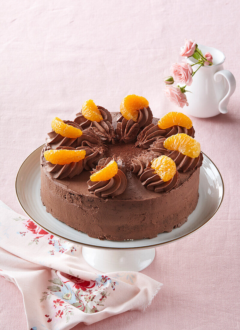 Chocolate cake with tangerines