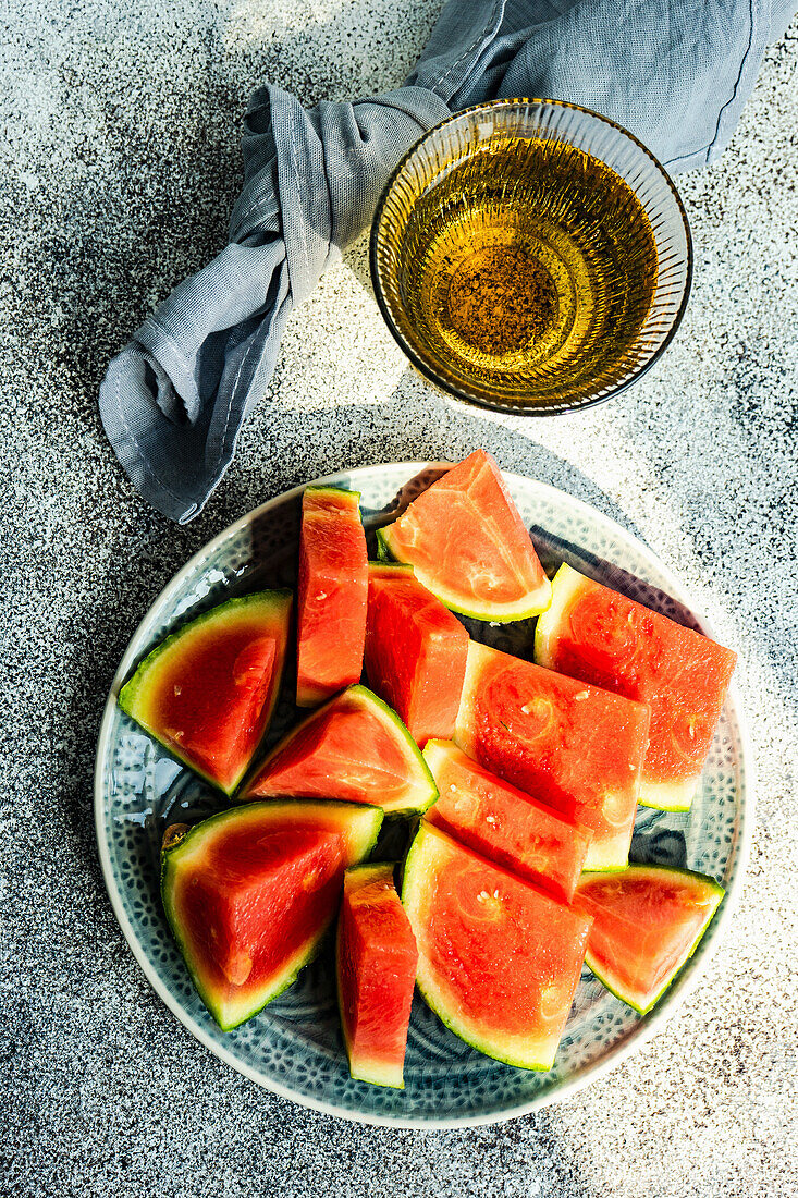 Tasty ripe watermelon on concrete background