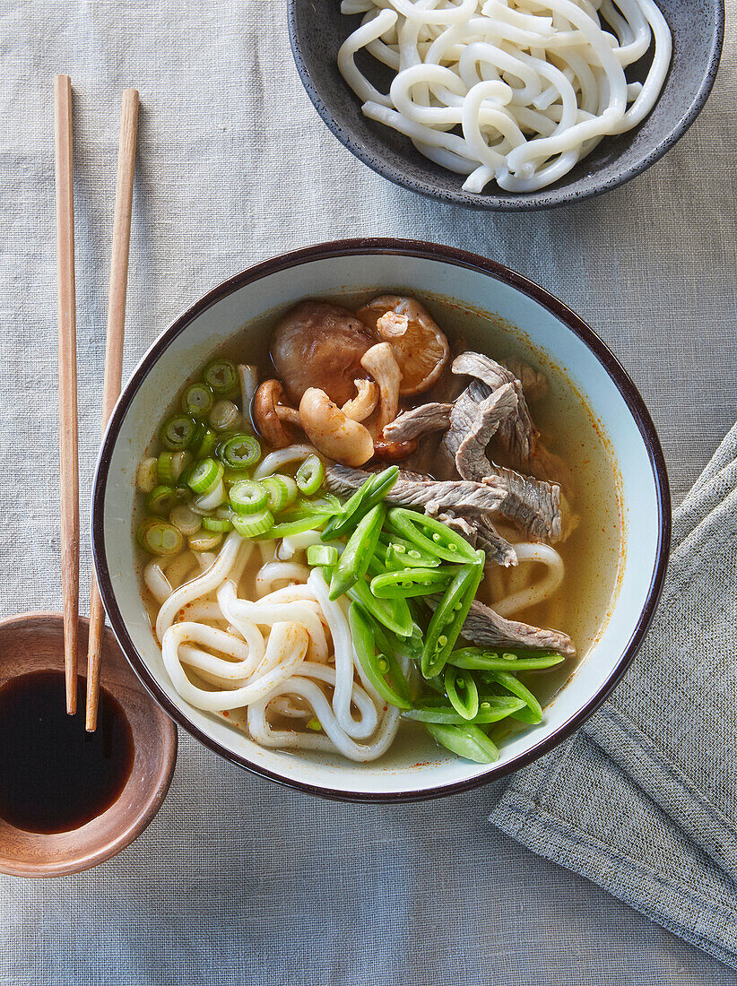 Beef soup with udon noodles