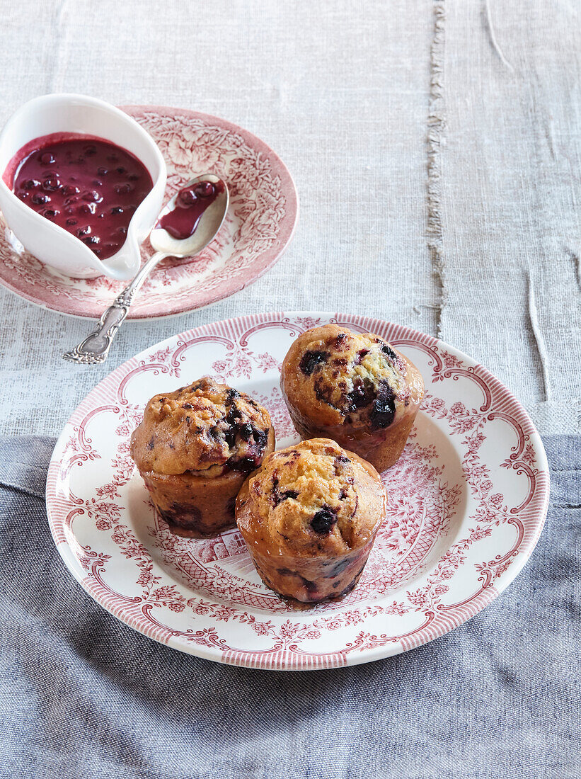 Blueberry muffins with blueberry sauce