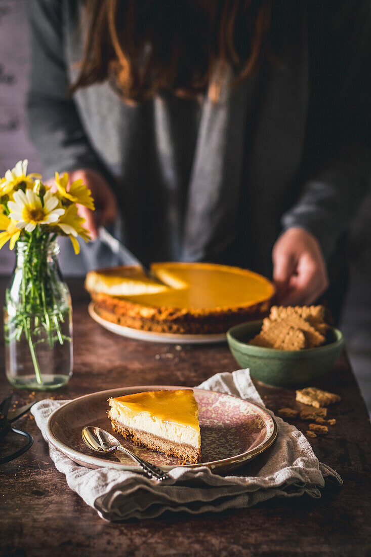 Baked lemon cheesecake served in a rustic kitchen