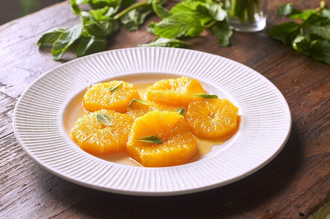 Orangenscheiben mit Minze und Honig