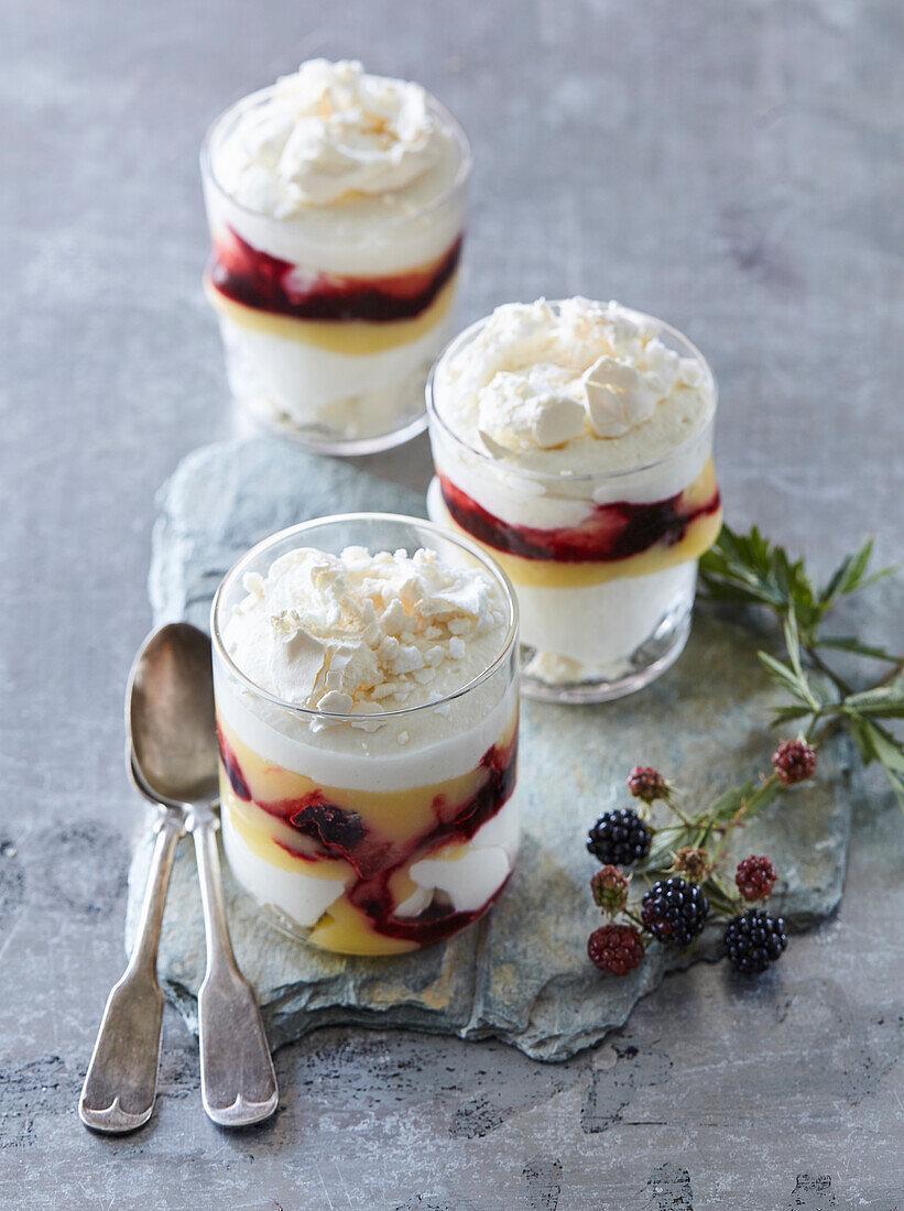 Blackberry triffle with whipped cream and meringue