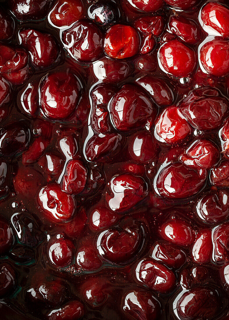 Close up of cherry sauce (Cherries Jubilee)