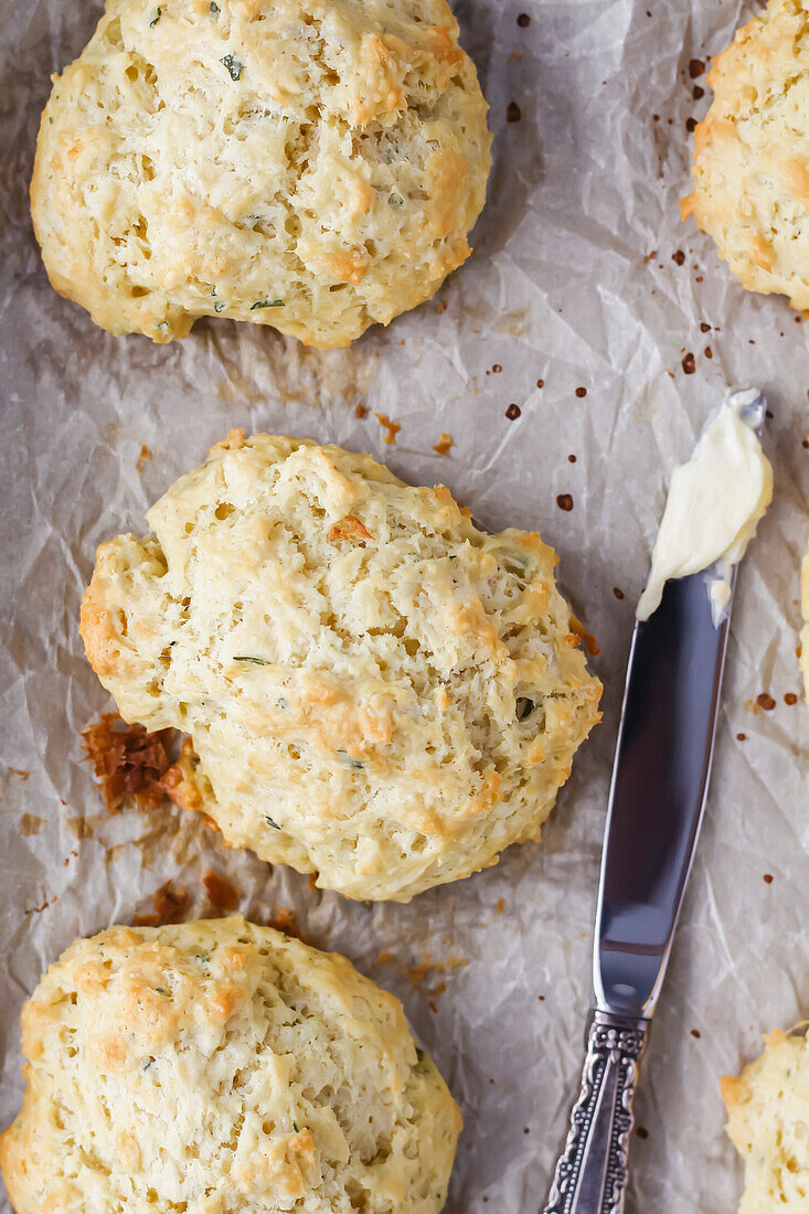 Fresh baked biscuits with butter on the side