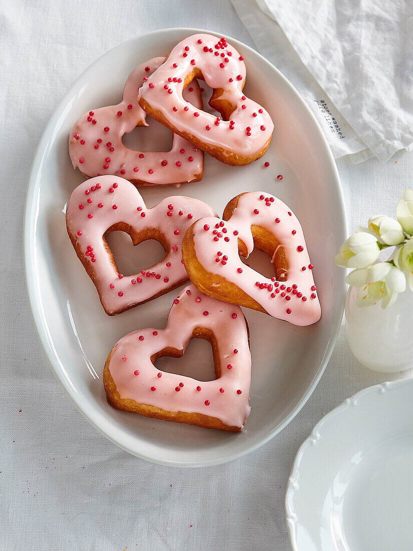Heart dougnuts with raspberry icing